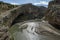 Boys are dwarfed by the enormous gorge carved out of the rock by the Cendere River near the town of Kocahisar in eastern Turkey.