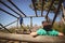 Boys exercising on monkey bar during obstacle course