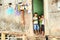 Boys and girl in door of poor house in Manado