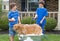 Boys Giving Dog a Bath