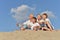 Boys with grandparents on the sand