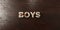 Boys - grungy wooden headline on Maple - 3D rendered royalty free stock image