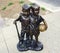 Boys Holding Basketball Statue