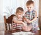 Boys are mixing mincemeat in a bowl