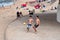 Boys paying beach soccer near the Millennium Pier and lighthouse in Umhlanga Rocks