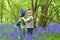 Boys playing in the bluebell woods