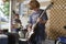 Boys Playing Drum And Guitar In Garage