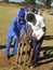 Boys playing mini cricket at a school ground.