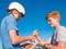 Boys Playing Paper, Rock, Scissors On The Santa Monica Pier