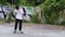 Boys practice skateboarding in an abandoned building in Denpasar