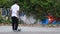 Boys practice skateboarding in an abandoned building in Denpasar