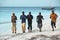 Boys running on the beach