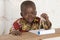 Boys in Science - Adorable African Boy Using a Compass during Ge