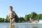 Boys swimming in the lake.