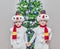 Boys, twins in carnival costumes of snowmen