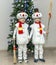 Boys, twins in carnival costumes of snowmen