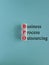 BPO- Business Process Outsourcing symbol. Wooden cubes with red words BPO. Beautiful blue background. Business and BPO concept.