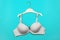 Bra on hanger on blue background