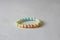 Bracelet from natural amazonite with gradients and silver bead. The bracelet on an elastic band, lies on a modern concrete light