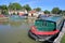 Bradford on Avon, UK - AUGUST 13, 2017: Canal Wharf with colorful barges on Kennet and Avon Canal