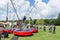 Bradford on Avon Wiltshire May 27th 2019 Children bouncing on a bungee trampoline while adults watch