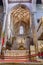 Braga, Portugal - December 28, 2017: Se de Braga Cathedral. Manuelino Gothic main chapel. Ornate stone carved altar. Oldest