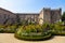 Braga, Portugal - Santa Barbara garden with the medieval Episcopal Palace of Braga