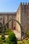 Braga, Portugal - Santa Barbara garden with the medieval Episcopal Palace of Braga