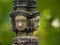 Brahma head status religion art green blur backgroung