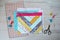 Braid pattern quilt, lining fabic, pink zipper, retro scissors , colorful clips, metal pins and quilting ruler