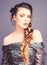 Braided hairstyle. French braid. Professional hair care and creating hairstyle. Beauty salon hairdresser art. Beautiful