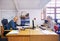 The brains behind the business. a two people working at their desk in the office of a warehouse.