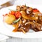 Braised beef with onion sauce and vegetables