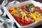 Braised meat paupiettes with bell peppers in ceramic bakeware
