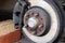 Brake disc and brake calipers of vehicle. Car brake pad. Car service. Automobile braking system