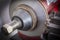 Brake lathe tool polishing disc brakes of cars working