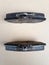 Brake pads black, already used, top view