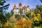 Bran Castle, Brasov, Transylvania, Romania. Autumn landscape wit