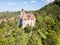 Bran castle on a hill. Dracula's Castle. Surrounded by Bran town, Wallachia, Transylvania, Romania.