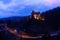 Bran Castle with lights at night in Romania