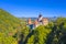 Bran Castle in summer landscape