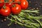 Branch of cherry ripe tomatoes, fresh rosemary, allspice, food photography