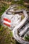 Branch on rock with red white marks for hiking path