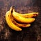 A branch of rotten ripe bananas on vintage wooden background. Overripe banana close up.