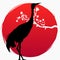 A branch with sakura flowers and a Japanese crane on the background of the red sun. Multi-exposure Sakura and Red - crowned crane.