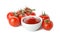 Branch of tomatoes and bowl with sauce isolated on background