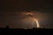 Branched lightning bolt strikes in the city of Tirgu Mures, Romania during an active springtime thunderstorm