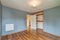 Brand new renovated bedroom blue walls brown wooden floor