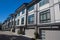 Brand new townhouse complex. Rows of townhomes side by side. External facade of a row of colorful modern urban townhouses. brand n