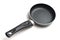 A brand new unused smaller sized frying pan with non-stick black teflon coating surface